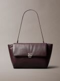 Red Defined by elegant, contemporary design, this collection features softly padded faux leather in elevated silhouettes. Finished with shiny Calvin Klein emblem hardware for a signature look  Women