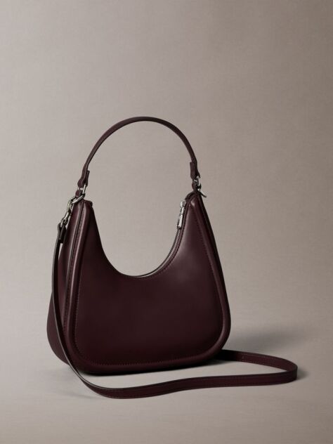 Red Embossed Monogram Crescent Bag  Women