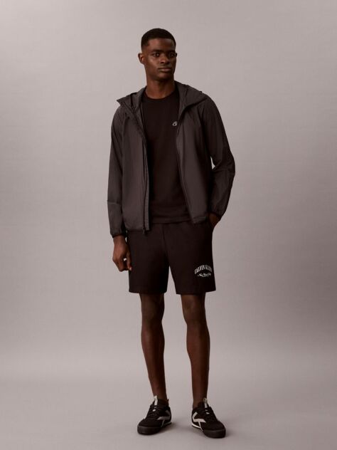 Black Add some varsity vibes to your wardrobe with these shorts, made from soft cotton terry featuring the new arched NYC logo.  Men