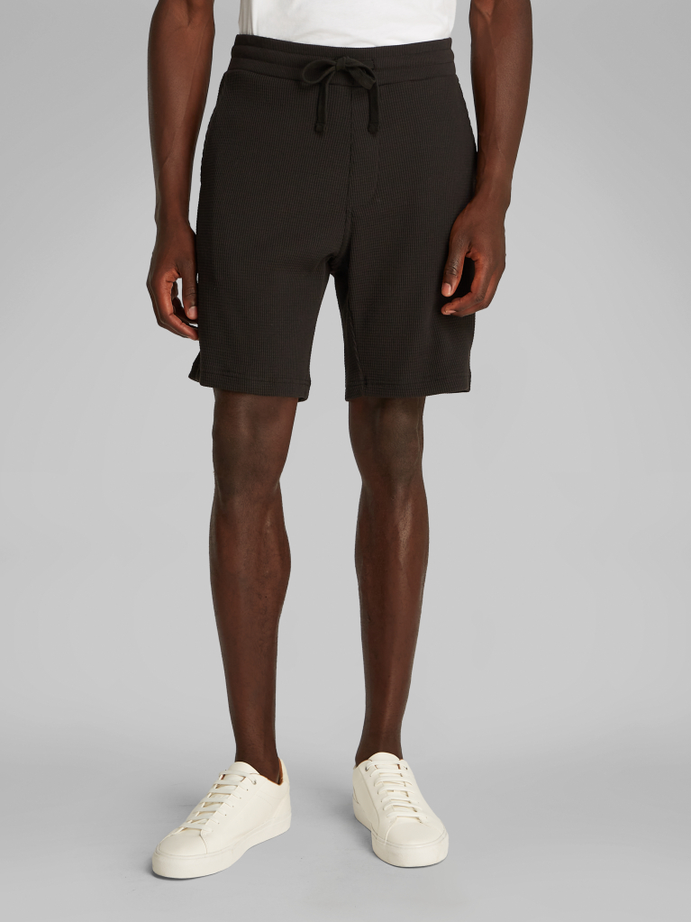 Black Men's waffle shorts, perfect for casual looks  Men
