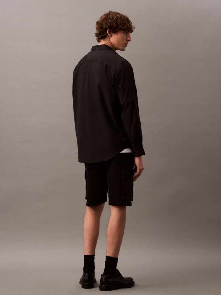 Black Comfortable and stylish. Cargo bermuda shorts, an easy-to-wear piece for casual style.  Men